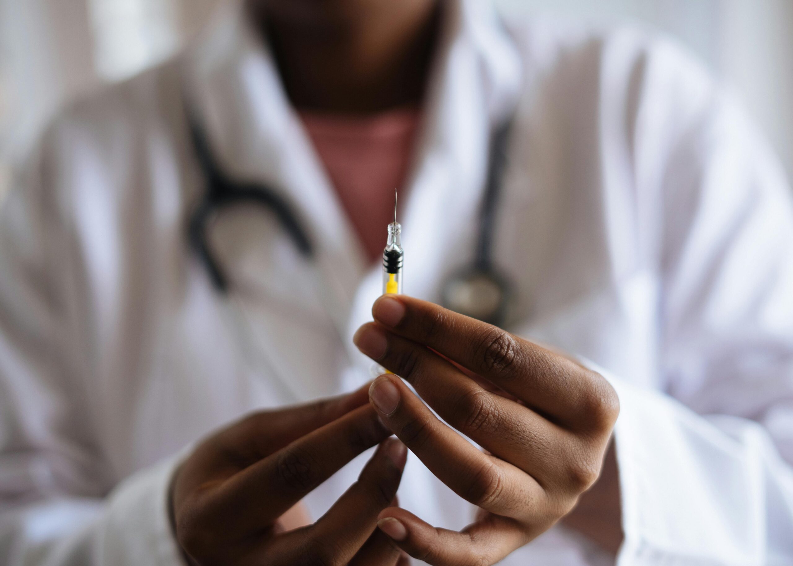 doctor having a needle in his hand